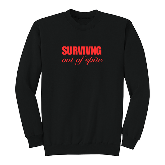 Front view of a black crewneck sweatshirt featuring the phrase "SURVIVING" in bold red block letters above the words "out of spite" in elegant red script centered on the chest. The clean, minimalist design stands out against the black fabric, creating a bold statement sweatshirt with a resilient and motivational aesthetic.