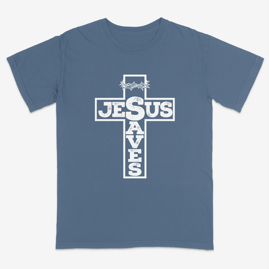 Blue jean faith-based graphic tee featuring a bold cross design with “Jesus Saves” typography and crown of thorns detail, combining vintage-inspired Christian artwork with a powerful message of salvation.