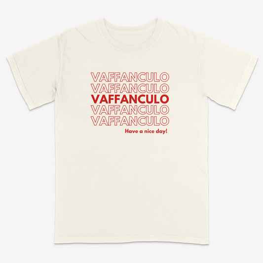 Ivory t-shirt with red text 'VAFFANCULO' repeated multiple times and 'Have a nice day!' at the bottom on a white background.