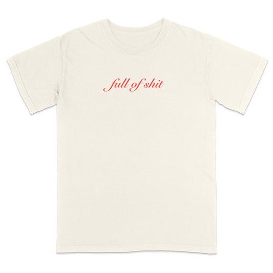 Front view of a ivory graphic T-shirt featuring the phrase "full of shit" in elegant red cursive lettering centered on the chest. This minimalist sarcastic tee combines clean typography with subtle humor, making it a stylish statement shirt for casual everyday wear.