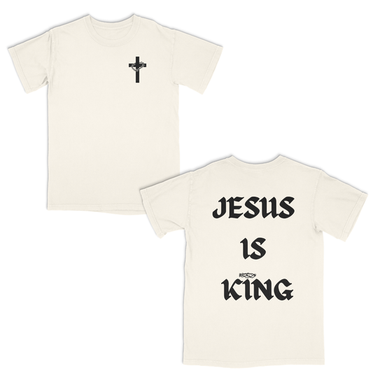 Ivory t-shirt with a black cross on the front and 'Jesus is King' text on the back.