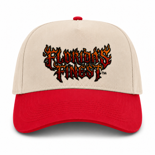 Front view of a cream and red two-tone snapback hat featuring bold embroidered "Florida's Finest™" lettering in a flame-inspired design across the front. The embroidery showcases a fiery red, orange, and black color scheme, creating a striking, edgy look. The structured cap features a cream crown, red curved brim, and matching red top button, delivering a bold statement style perfect for everyday wear and Florida-inspired streetwear.