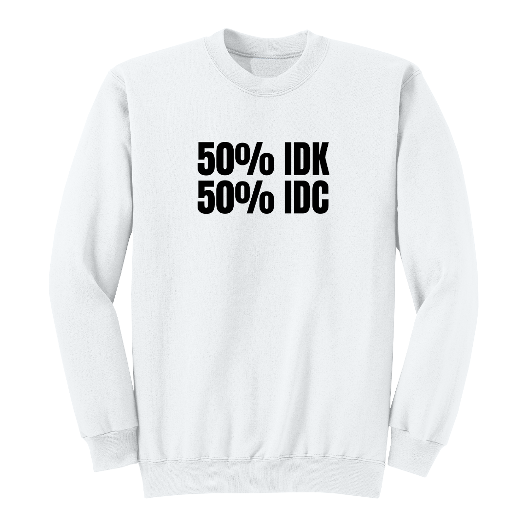 Front view of a white crewneck sweatshirt featuring the bold black phrase "50% IDK 50% IDC" printed across the chest. This minimalist funny graphic sweatshirt offers a clean, modern design with a classic fit, making it perfect for casual everyday wear or gifting to someone with a sarcastic sense of humor.