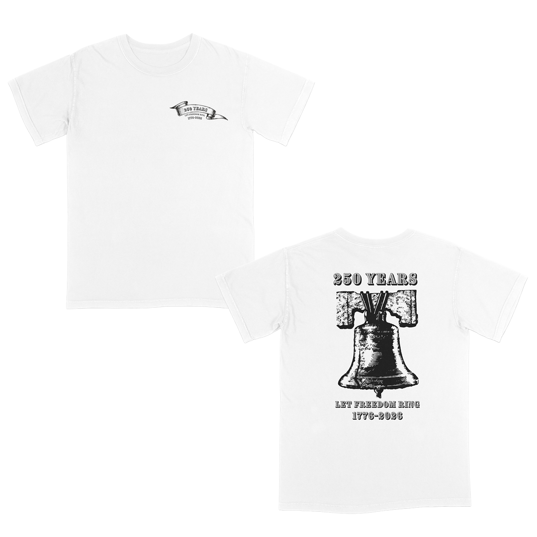 White vintage-inspired patriotic graphic tee celebrating 250 years of American freedom, featuring a distressed Liberty Bell back design with “Let Freedom Ring 1776–2026” and a subtle matching front chest emblem.