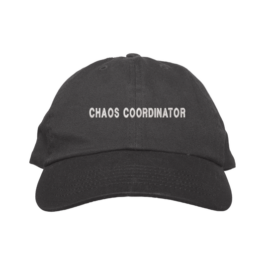 Black cap with 'CHAOS COORDINATOR' text on a white background
