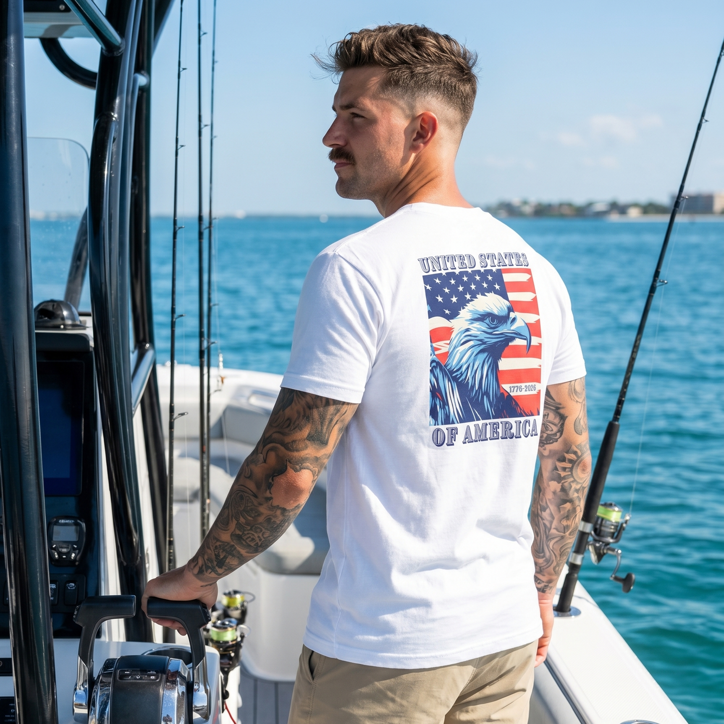 Man wearing a patriotic graphic t-shirt featuring a bald eagle set against an American flag with the text “United States of America” and the years 1776–2026. Patriotic apparel celebrating America’s 250th anniversary, freedom, American heritage, national pride, and the enduring spirit of the United States.