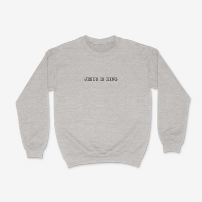 Ash sweatshirt with 'Jesus is King' text on a white background