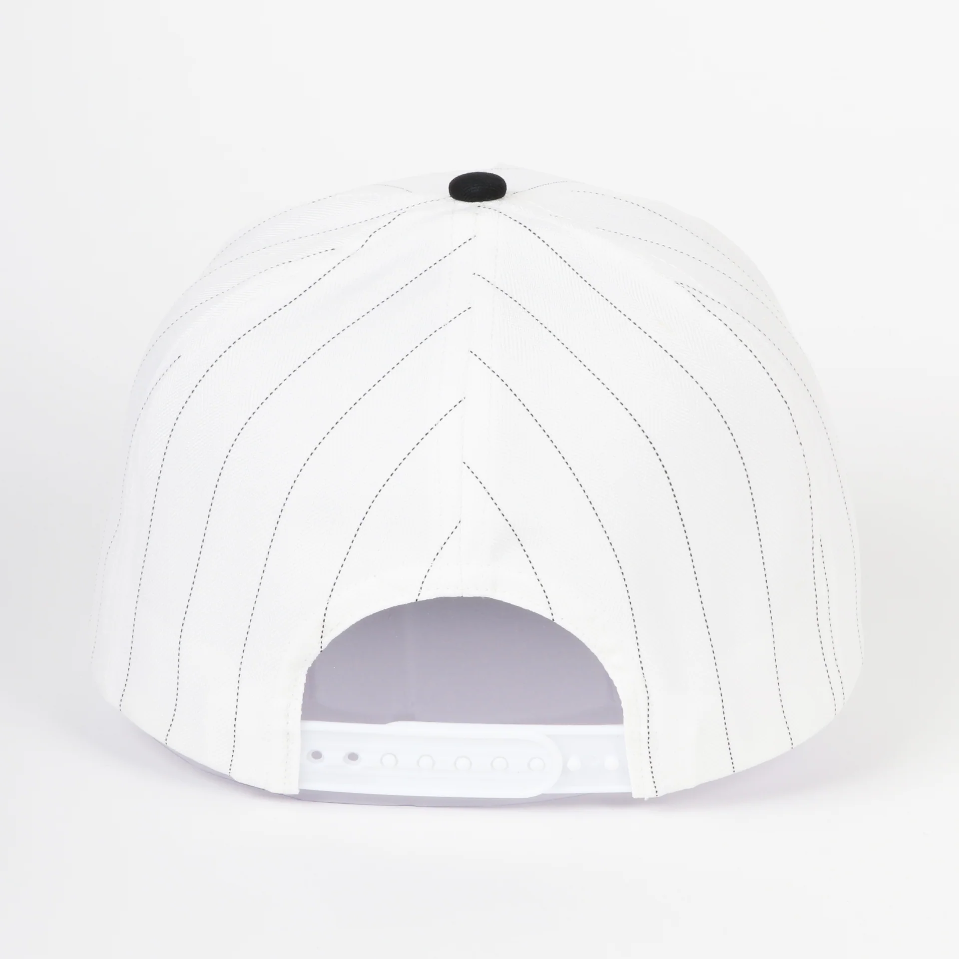 White pinstripe snapback cap back view featuring thin black pinstripes, adjustable tonal snap closure, and a clean vintage baseball-inspired design.
