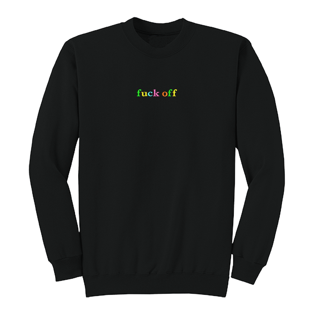 Front view of a black long sleeve crewneck featuring the phrase "fuck off" in small lowercase letters centered across the chest. Each letter is embroidered in a different bright color, creating a subtle rainbow-inspired design with a clean, minimalist aesthetic. A bold adult long sleeve shirt with colorful typography, casual streetwear style, and sarcastic humor.