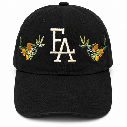 Black baseball cap featuring a white embroidered “FLA” logo on the front, accented with colorful citrus and floral embroidery on both sides for a Florida-inspired design.