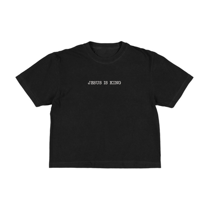 Black boxy tee with 'Jesus Is King' text on a white background