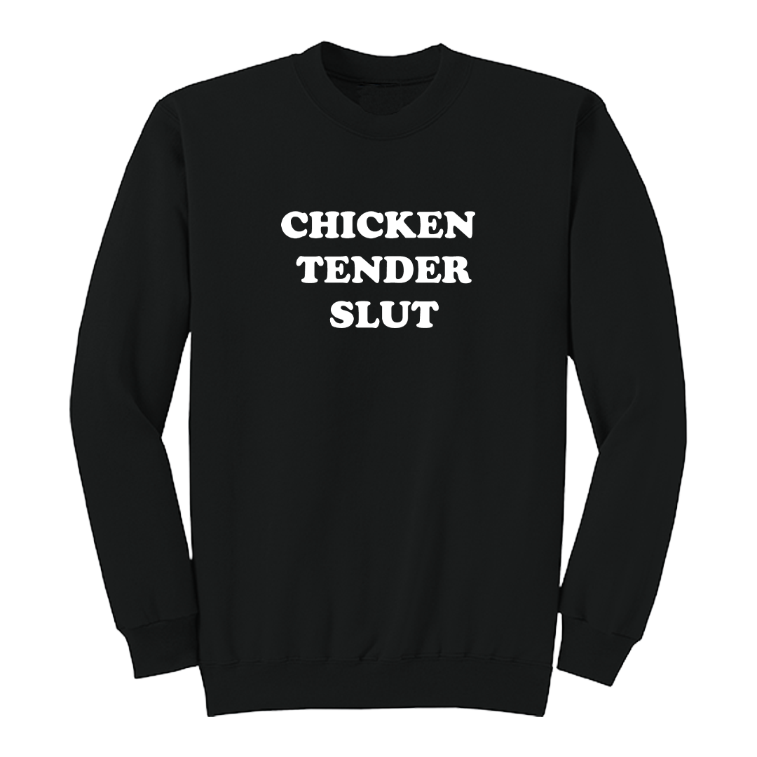 Front view of a black crewneck sweatshirt featuring the bold white stacked phrase "CHICKEN TENDER SLUT" in large retro bubble lettering centered on the chest. The simple vintage-inspired typography stands out against the black fabric, creating a humorous foodie-themed graphic sweatshirt with a clean, minimalist, and playful design.