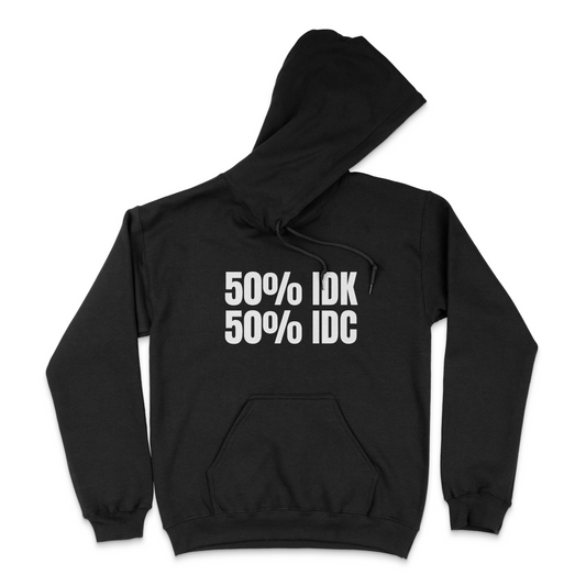 Front view of a black pullover hoodie featuring the bold white text "50% IDK 50% IDC" centered on the chest. The hoodie includes an adjustable drawstring hood and kangaroo pocket, displayed on a white background to showcase the clean, minimalist humorous design.