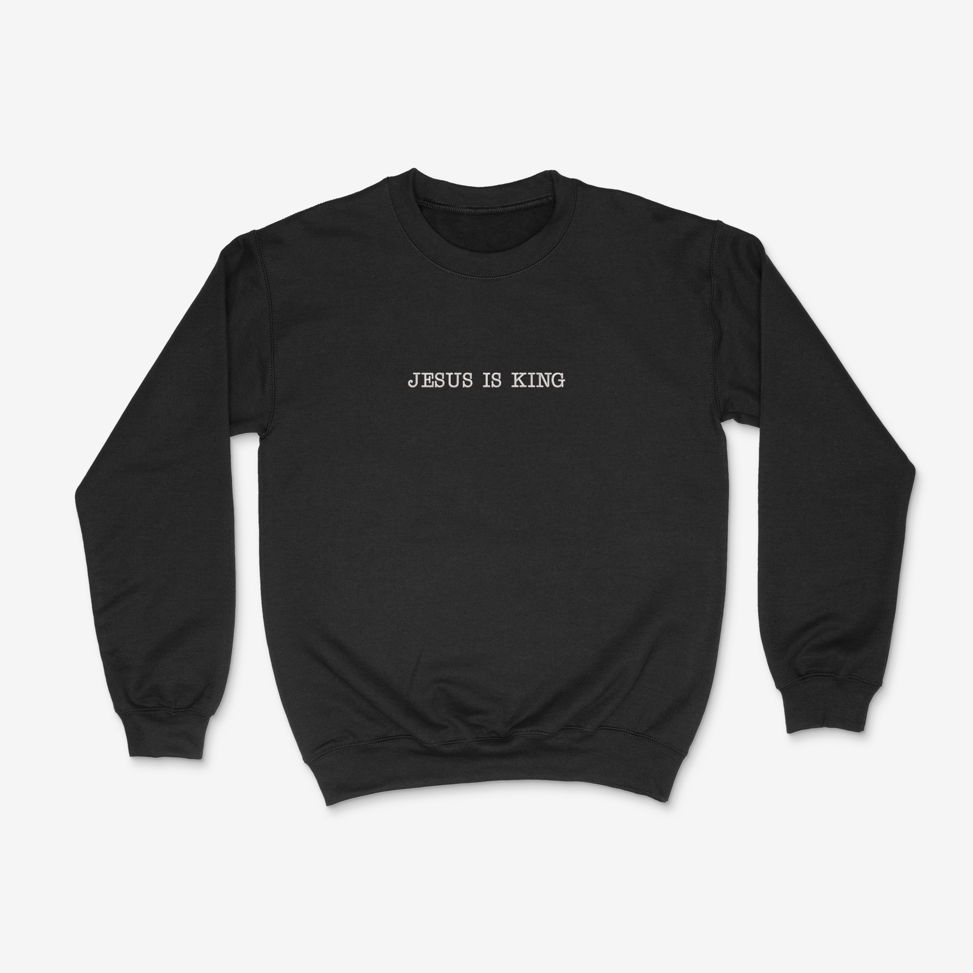 Black sweatshirt with 'Jesus is King' text on a white background