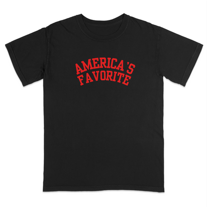 Black patriotic graphic tee with bold red varsity-style “America’s Favorite” lettering, featuring a clean minimalist Americana design perfect for casual Fourth of July and USA pride apparel.