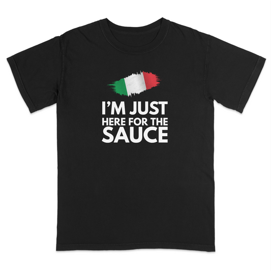 Funny Italian heritage t-shirt featuring the phrase “I’m Just Here for the Sauce” in bold white lettering with an Italian flag brushstroke graphic, perfect for Italian food lovers, family gatherings, pasta nights, and casual everyday wear.