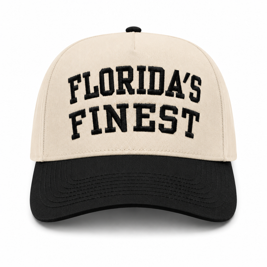 Cream and black baseball cap featuring bold black embroidered “Florida’s Finest” text on the front, contrasting black brim, and a structured crown for a classic vintage-inspired look.