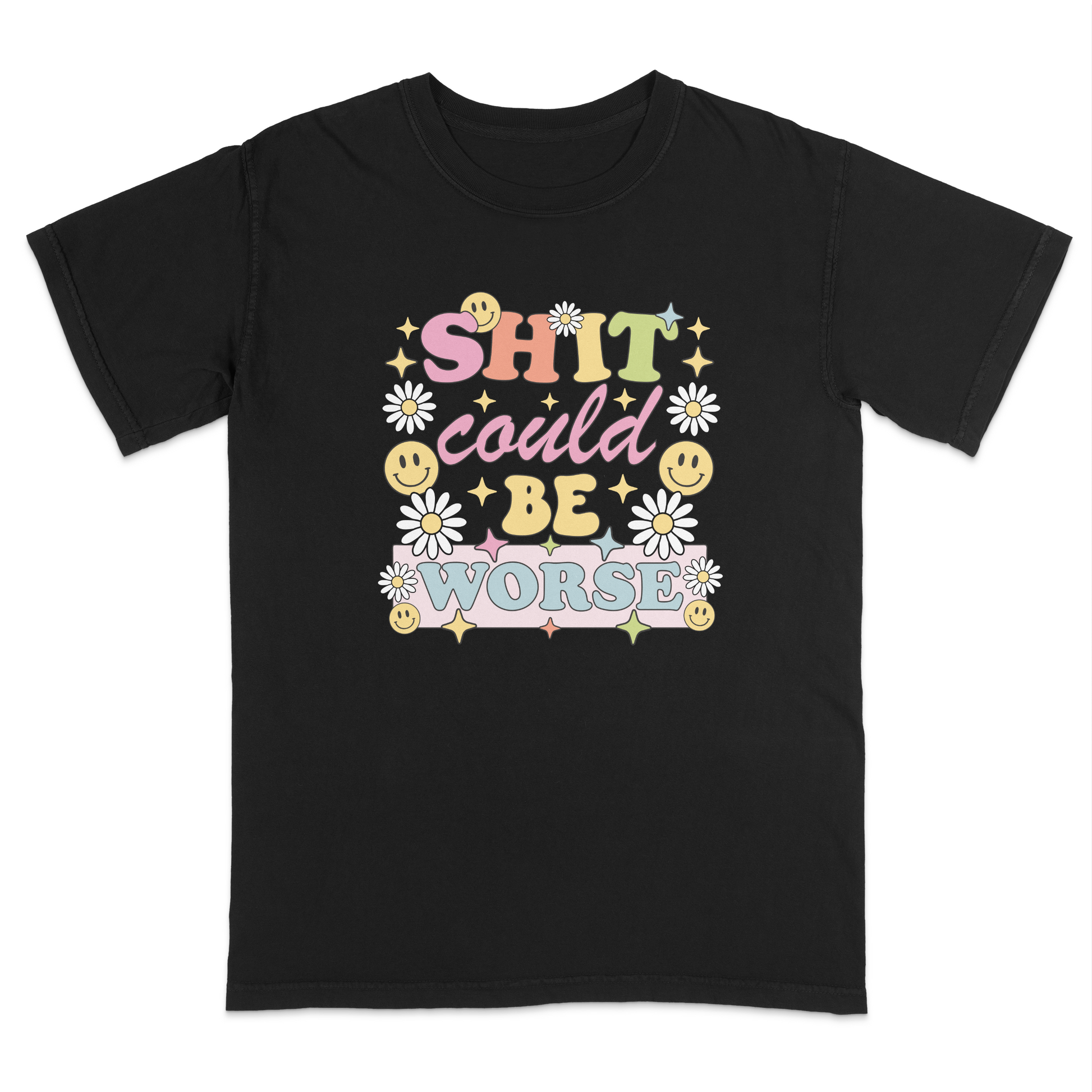 Front view of a black graphic t-shirt featuring a retro-inspired pastel design with the phrase "SHIT could BE WORSE" in colorful vintage lettering. The design is decorated with white daisies, yellow smiley faces, and sparkling star accents, creating a playful 70s aesthetic that contrasts with the humorous sarcastic message. A funny adult graphic tee with retro floral artwork, pastel colors, and bold statement typography for casual everyday wear.