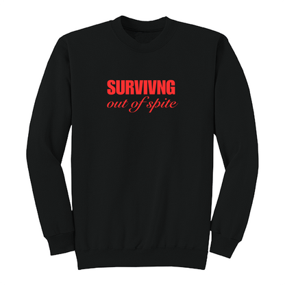 Front view of a black crewneck sweatshirt featuring the phrase "SURVIVING" in bold red block letters above the words "out of spite" in elegant red script centered on the chest. The clean, minimalist design stands out against the black fabric, creating a bold statement sweatshirt with a resilient and motivational aesthetic.