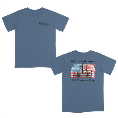 Blue jean patriotic graphic tee featuring a vintage sailing ship over an American flag with “Stars & Stripes” and “Let Freedom Ring” artwork celebrating 250 years of American freedom and heritage.