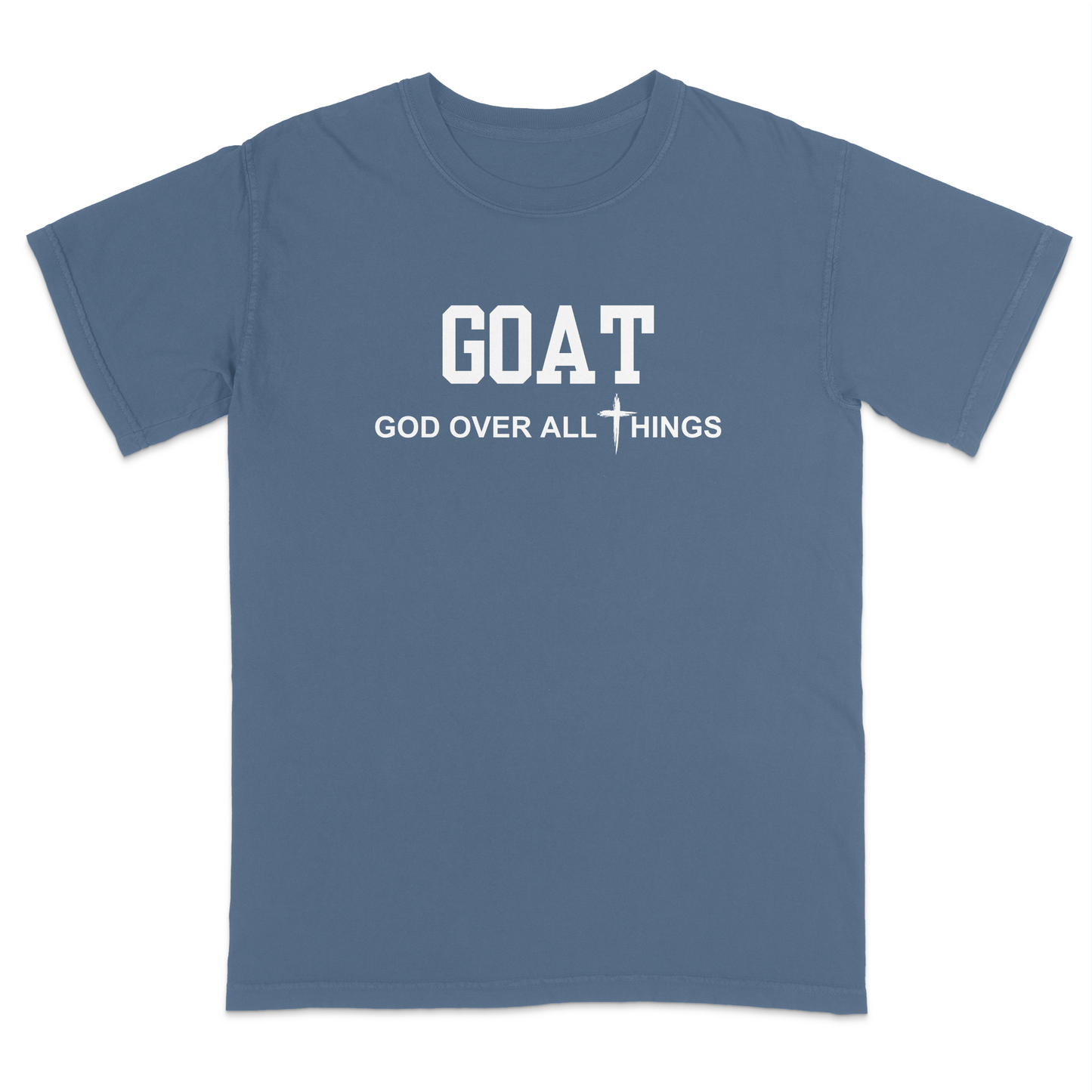 Blue jean faith-based Christian t-shirt featuring the bold word “GOAT” across the chest with the phrase “God Over All Things” underneath and a white cross graphic. Inspirational religious apparel designed for believers, church events, youth groups, Christian streetwear, Bible study gatherings, and everyday faith-centered fashion.