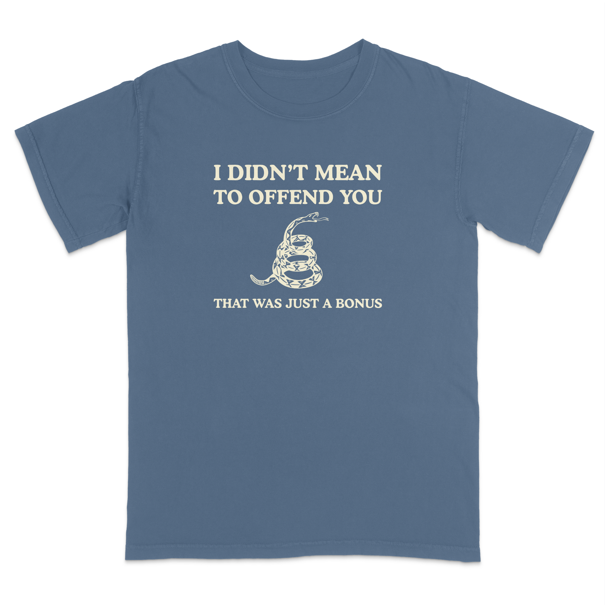 Front view of a blue jean graphic T-shirt featuring the humorous phrase "I DIDN'T MEAN TO OFFEND YOU" above a coiled rattlesnake illustration and the text "THAT WAS JUST A BONUS." This vintage-inspired graphic tee combines bold typography with Western-style artwork for a funny, sarcastic everyday shirt.