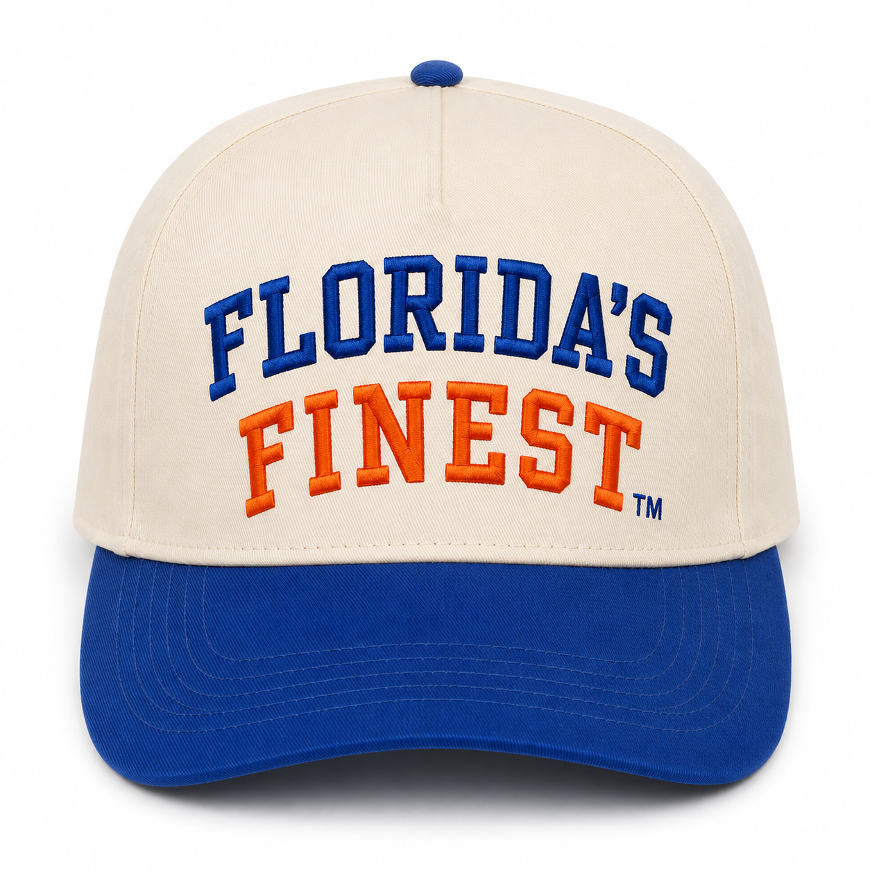 Cream and royal blue two-tone snapback hat featuring embroidered “Florida’s Finest™” text in bold collegiate lettering across the front. The cream crown is paired with a royal blue curved brim, with “Florida’s” stitched in royal blue and “Finest” embroidered in vibrant orange. Stylish Florida-inspired headwear perfect for game days, beach trips, tailgates, outdoor adventures, and everyday Florida pride.