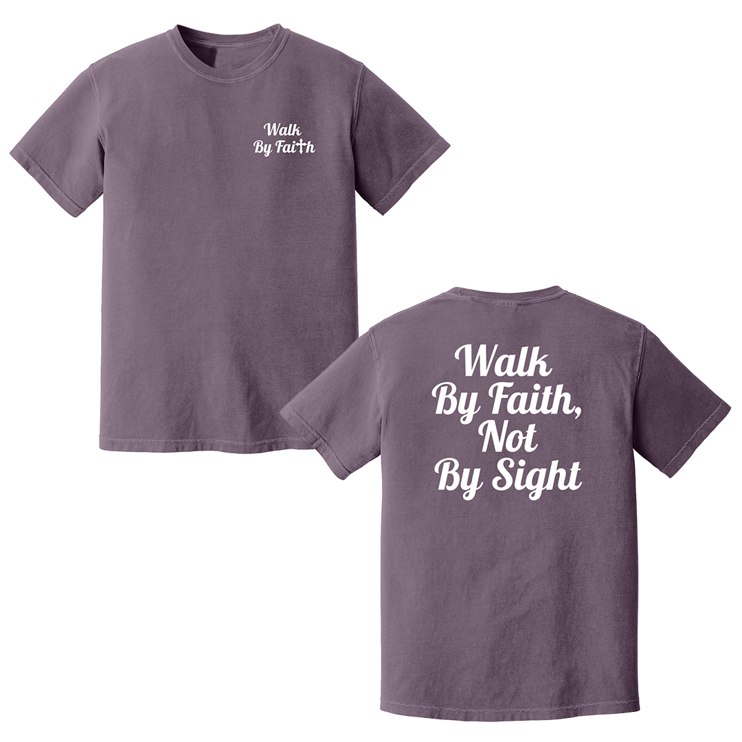 Front and back view of a dusk faith-based graphic t-shirt featuring “Walk By Faith” text on the chest and oversized “Walk By Faith, Not By Sight” typography on the back in white script lettering.