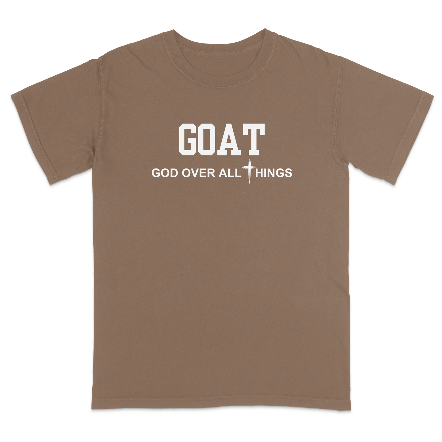 Brown faith-based Christian t-shirt featuring the bold word “GOAT” across the chest with the phrase “God Over All Things” underneath and a white cross graphic. Inspirational religious apparel designed for believers, church events, youth groups, Christian streetwear, Bible study gatherings, and everyday faith-centered fashion.