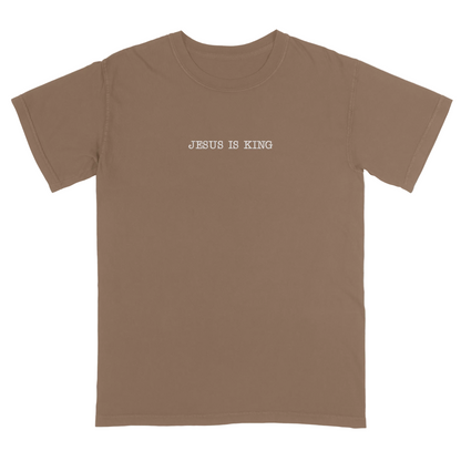 Brown t-shirt with 'Jesus Is King' text on a white background
