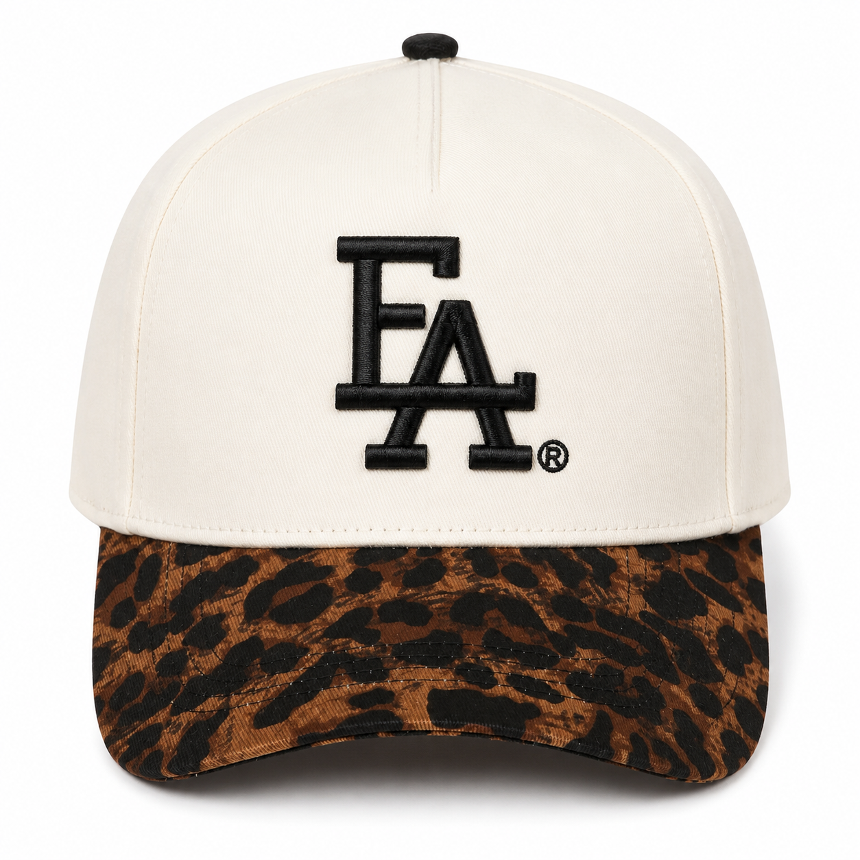 Front view of a cream and black structured cap featuring a bold embroidered “FLA®” logo with a curved leopard print brim and modern streetwear-inspired design.