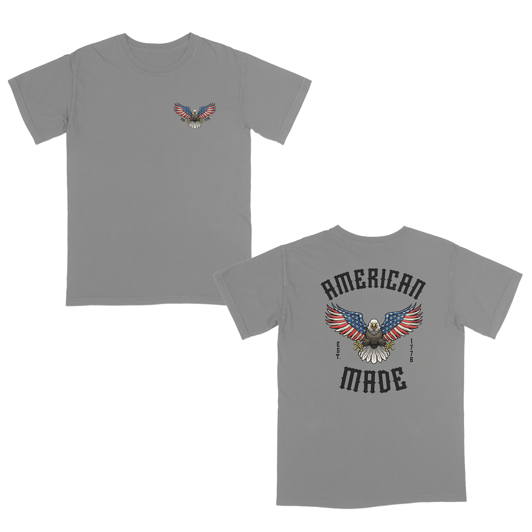 Grey t-shirt with eagle design and 'American Made' text on a white background