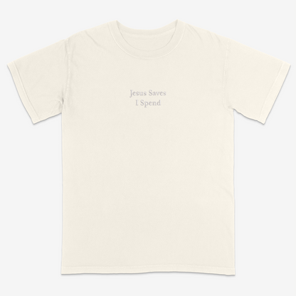 Ivory t-shirt with 'Jesus Saves I Spend' text on a white background