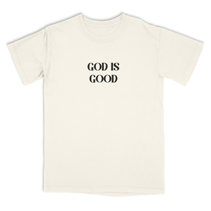 Ivory t-shirt with 'GOD IS GOOD' text on a white background