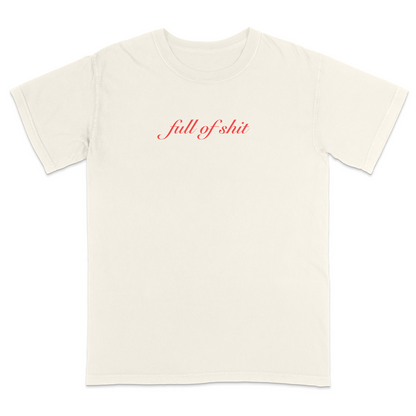 Front view of a ivory graphic T-shirt featuring the phrase "full of shit" in elegant red cursive lettering centered on the chest. This minimalist sarcastic tee combines clean typography with subtle humor, making it a stylish statement shirt for casual everyday wear.