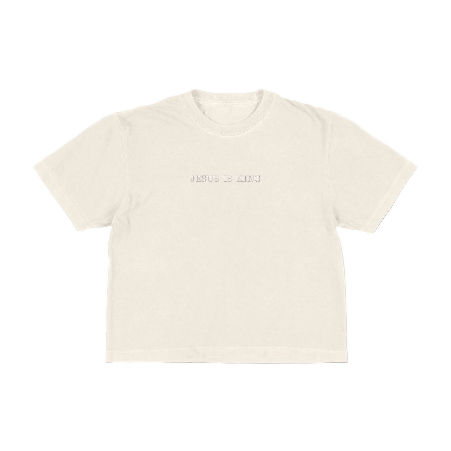 Ivory boxy tee with 'Jesus Is King' text on a white background