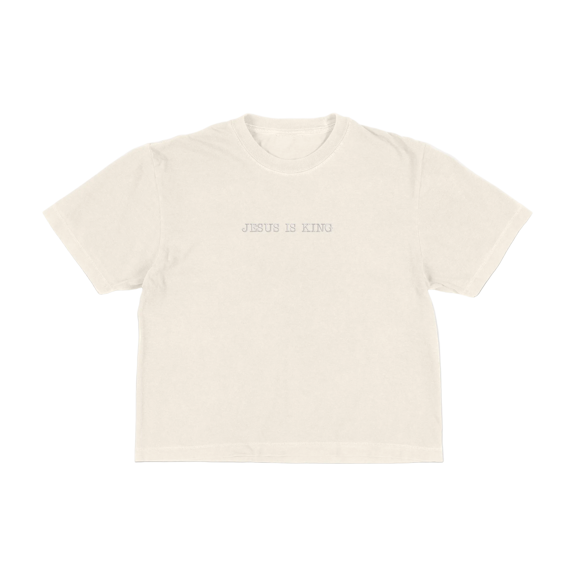 Ivory boxy tee with 'Jesus Is King' text on a white background