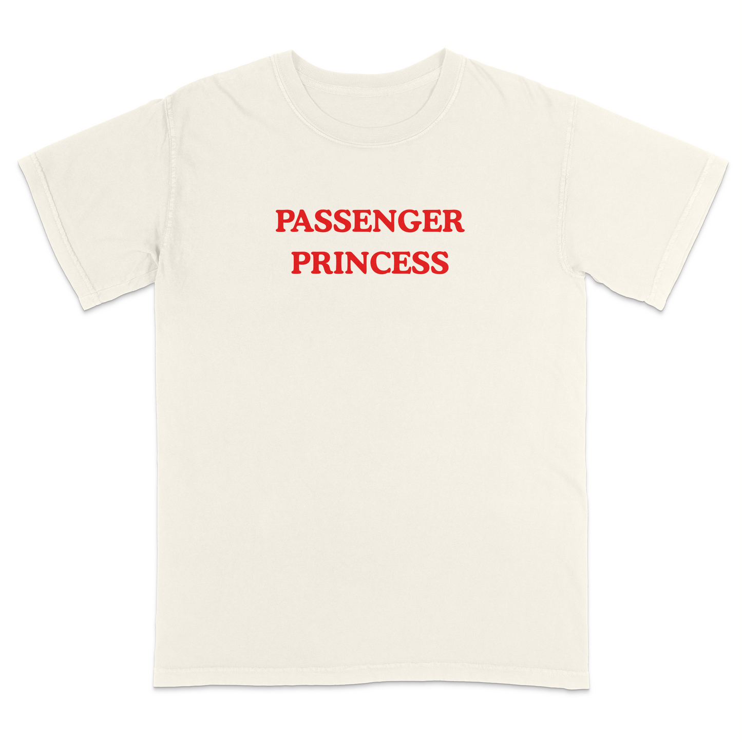 Front view of a ivory graphic T-shirt featuring the phrase "PASSENGER PRINCESS" in bold red vintage-style lettering centered across the chest. This minimalist graphic tee offers a playful automotive-inspired design, making it perfect for road trips, date nights, vacations, casual outings, and everyday wear.