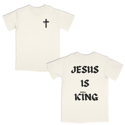 Ivory t-shirt with a black cross on the front and 'Jesus is King' text on the back.