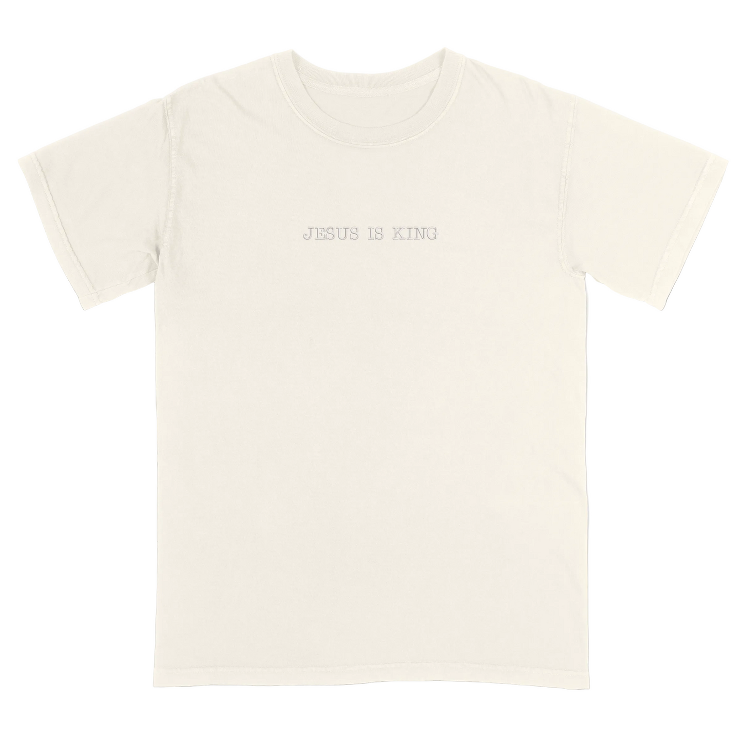Ivory t-shirt with 'Jesus Is King' text on a white background