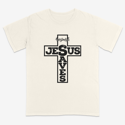 Ivory faith-based graphic tee featuring a bold cross design with “Jesus Saves” typography and crown of thorns detail, combining vintage-inspired Christian artwork with a powerful message of salvation.