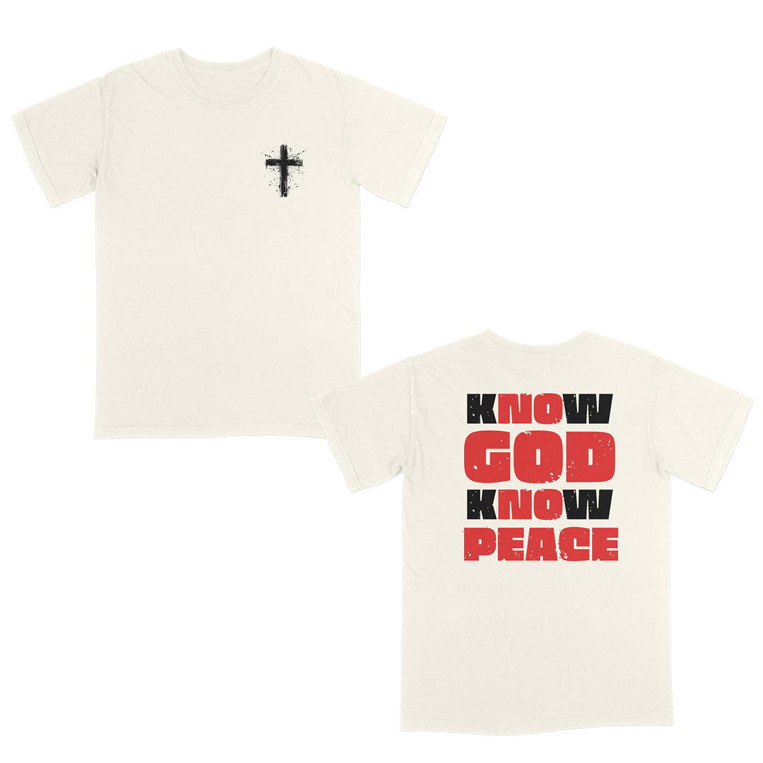 Ivory faith-based graphic tee featuring a distressed white cross on the front and bold “Know God Know Peace” typography on the back in red and white for a powerful Christian streetwear-inspired design.