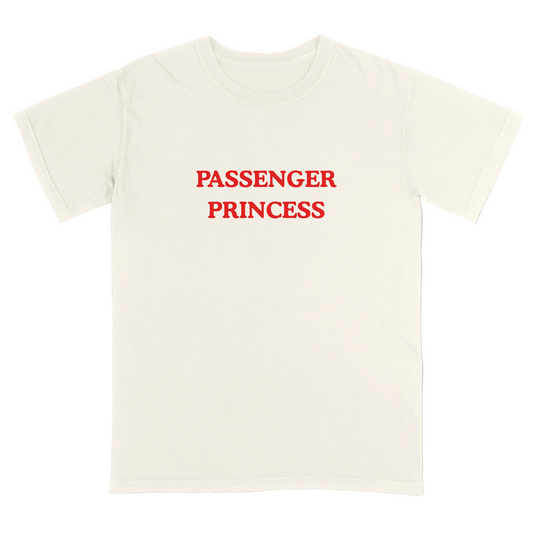 Ivory t-shirt with 'Passenger Princess' text in red on a light gray background