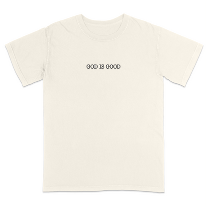 Ivory t-shirt with 'GOD IS GOOD' text on a white background