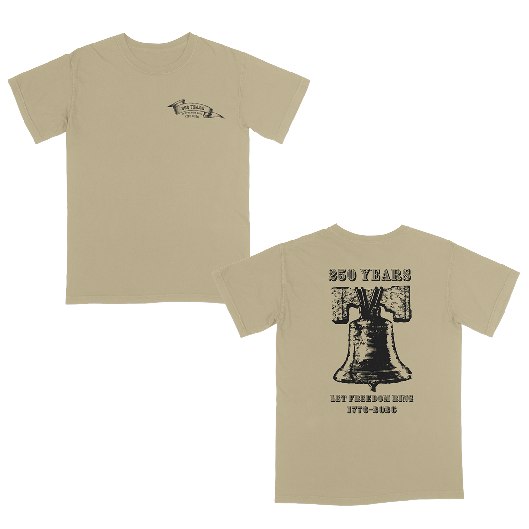 Khaki vintage-inspired patriotic graphic tee celebrating 250 years of American freedom, featuring a distressed Liberty Bell back design with “Let Freedom Ring 1776–2026” and a subtle matching front chest emblem.