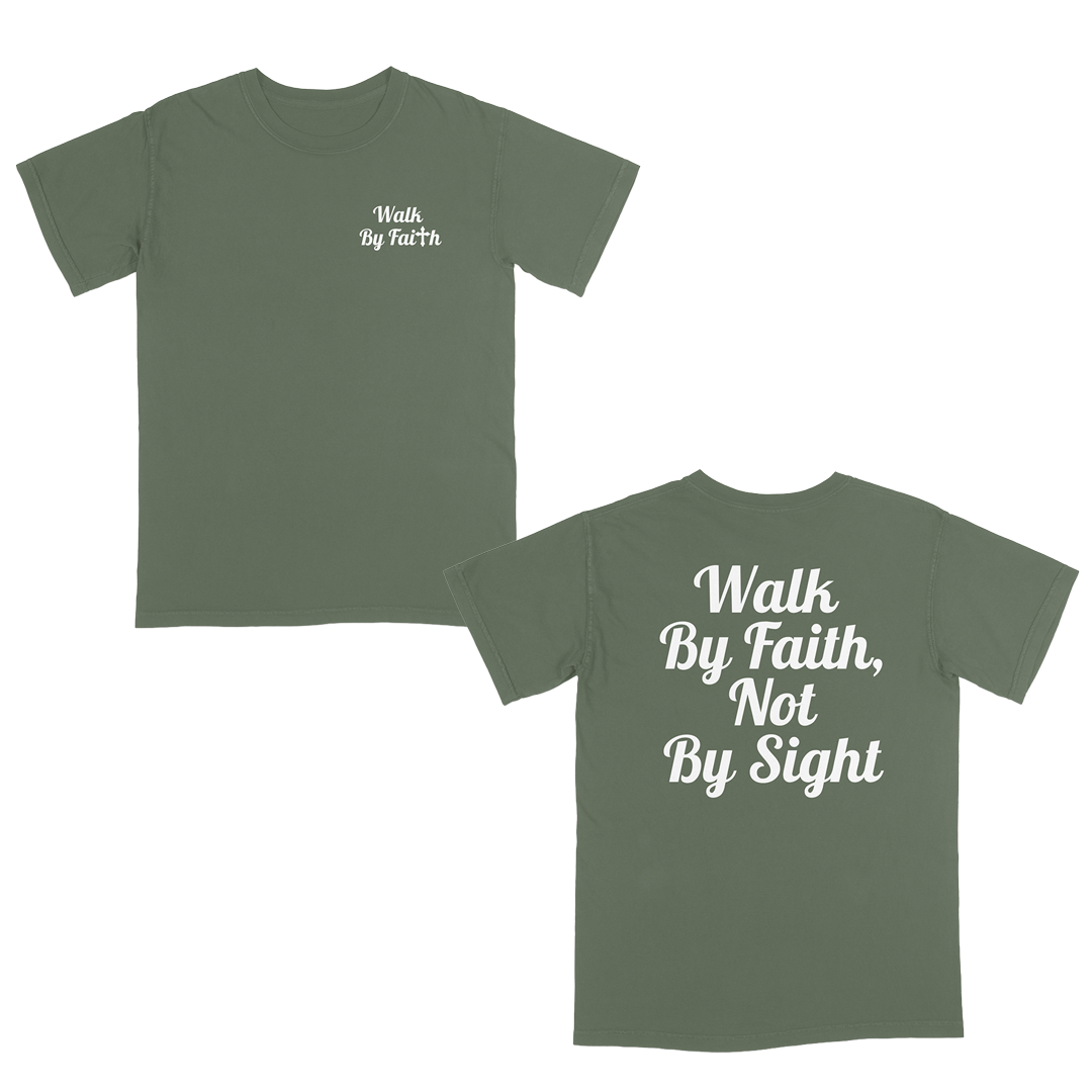 Front and back view of a moss faith-based graphic t-shirt featuring “Walk By Faith” text on the chest and oversized “Walk By Faith, Not By Sight” typography on the back in white script lettering.