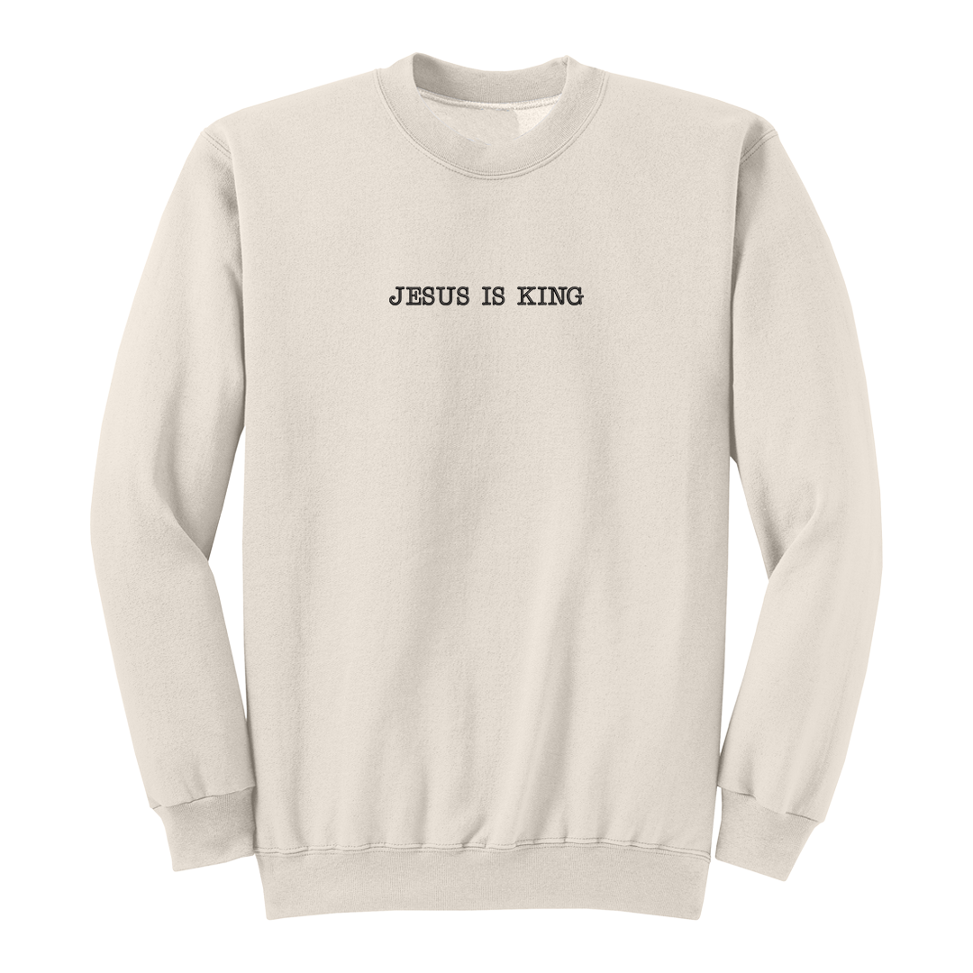Natural sweatshirt with 'Jesus is King' text on a white background