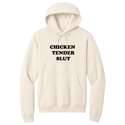 Front view of a natural pullover hoodie featuring the bold black stacked phrase "CHICKEN TENDER SLUT" in large retro bubble lettering centered on the chest. The minimalist design contrasts sharply against the black fabric for a clean, eye-catching look, creating a funny foodie-themed hoodie with vintage-inspired typography and a playful sarcastic aesthetic.