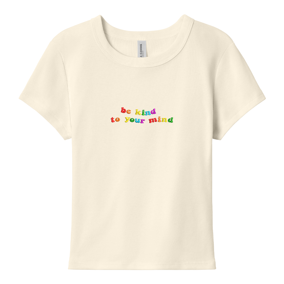 Natural baby tee with 'be kind to your mind' text in colorful letters on a white background
