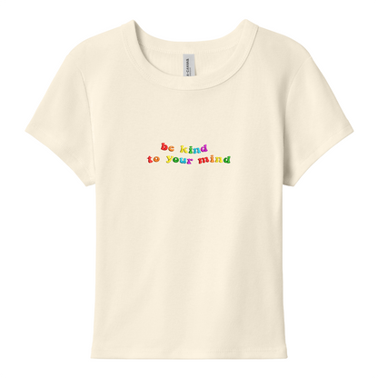 Natural baby tee with 'be kind to your mind' text in colorful letters on a white background